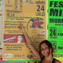 Martina a Medesano con il cartellone pubblicitario della serata